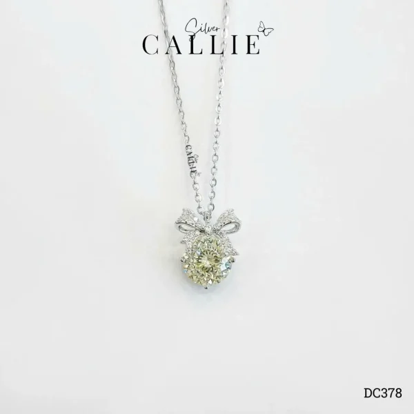 DC378 - Dây chuyền bạc Callie Silver mặt dây nơ đá vàng nhạt 8li