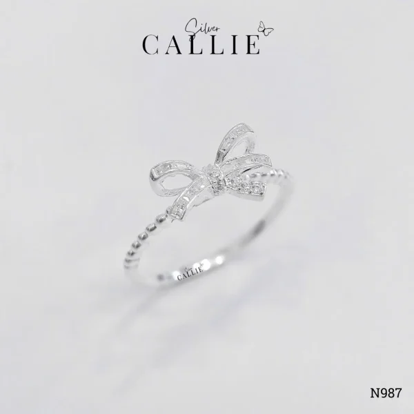 N987 - Nhẫn bạc Callie Silver nơ đá đai bi nửa nhẫn